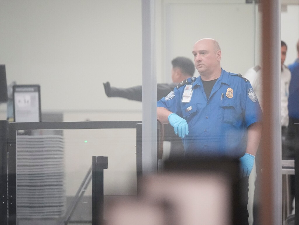 (Bethany Baker  |  The Salt Lake Tribune) A TSA agent waits to assist a traveler at the Salt Lake City International Airport in Salt Lake City on Wednesday, Oct. 1, 2025.