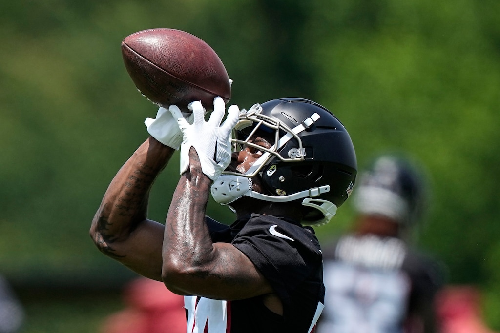 FILE - Atlanta Falcons defensive back Clark Phillips III (34) runs drills during the NFL football team's rookie minicamp, Saturday, May 13, 2023, in Flowery Branch, Ga. Falcons rookie cornerback Clark Phillips III was carted off the practice field with a leg injury during Tuesday's, Aug. 8, 2023, joint practice with the Miami Dolphins. (AP Photo/Brynn Anderson, File)