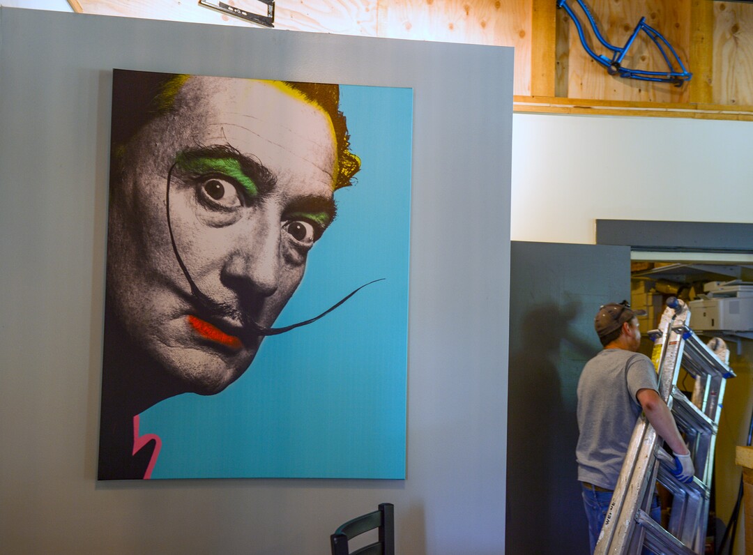 (Leah Hogsten  |  The Salt Lake Tribune) HandleBar, a new "biker" bar in Salt Lake City's Marmalade neighborhood, features iconic photos of famous mustached men like Salvador Dali.