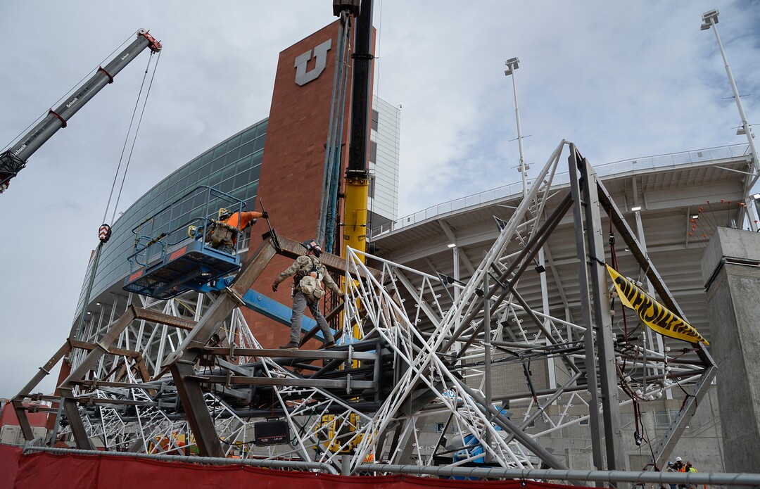 (Francisco Kjolseth  |  The Salt Lake Tribune) Crews prepare the Olympic cauldron as it is returned to the University of Utah on Friday, Jan. 29, 2021, after a refurbishment to lengthen its life span. Removed in February 2020, the cauldron was transported to an off-site location, where all 738 glass panes were removed and the complete structure was sandblasted and refinished. The refurbished structure was placed on a newly constructed, 17-foot-tall pedestal, just north of the stadium ticket office, with plans to add high-quality glass.