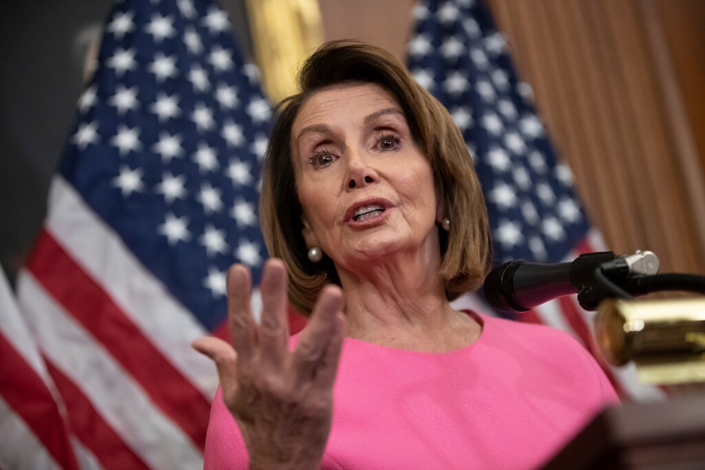 (J. Scott Applewhite | The Associated Press) In this Nov. 7, 2018, file photo, House Minority Leader Nancy Pelosi, D-Calif., speaks in during a news conference on Capitol Hill in Washington. House Democrats are laying out a vision for their new majority, and one item is noticeably missing from the to-do list: President Donald Trump’s impeachment. They’re making plans for spending on public works projects, lowering health costs and increasing government oversight. It’s the balance that Pelosi is trying to strike.