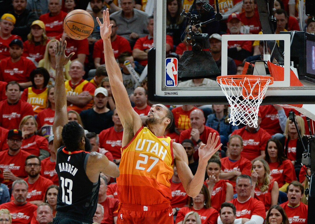 (Francisco Kjolseth  |  The Salt Lake Tribune)  Houston Rockets guard James Harden (13) is smacked away by Utah Jazz center Rudy Gobert (27) in Game 3 of a first-round NBA basketball playoff series in Salt Lake City, Saturday, April 20, 2019.