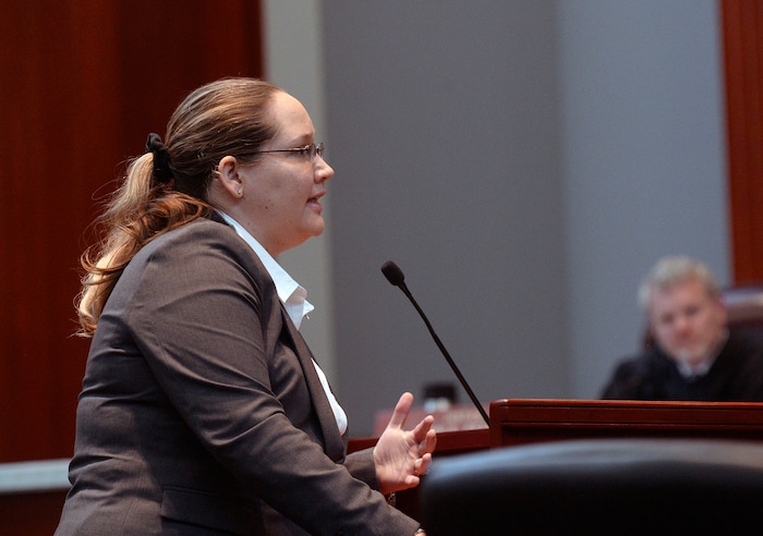 (Al Hartmann  |  The Salt Lake Tribune) 	
Federal public defender Charlotte Merrill, left, argues before the Utah Supreme Court Wednesday Jan. 10. The court heard arguments regarding Anthony Michael Archuleta, 55, who has been on death row since his conviction in 1989 for the Nov. 21, 1988, torture slaying of Gordon Ray Church, a 28-year-old Southern Utah State College theater student, at a remote location in Millard County. In separate trials, Archuleta and co-defendant Lance Conway Wood each were convicted of capital murder. Wood was sentenced to life in prison. Archuleta was sentenced to death. 