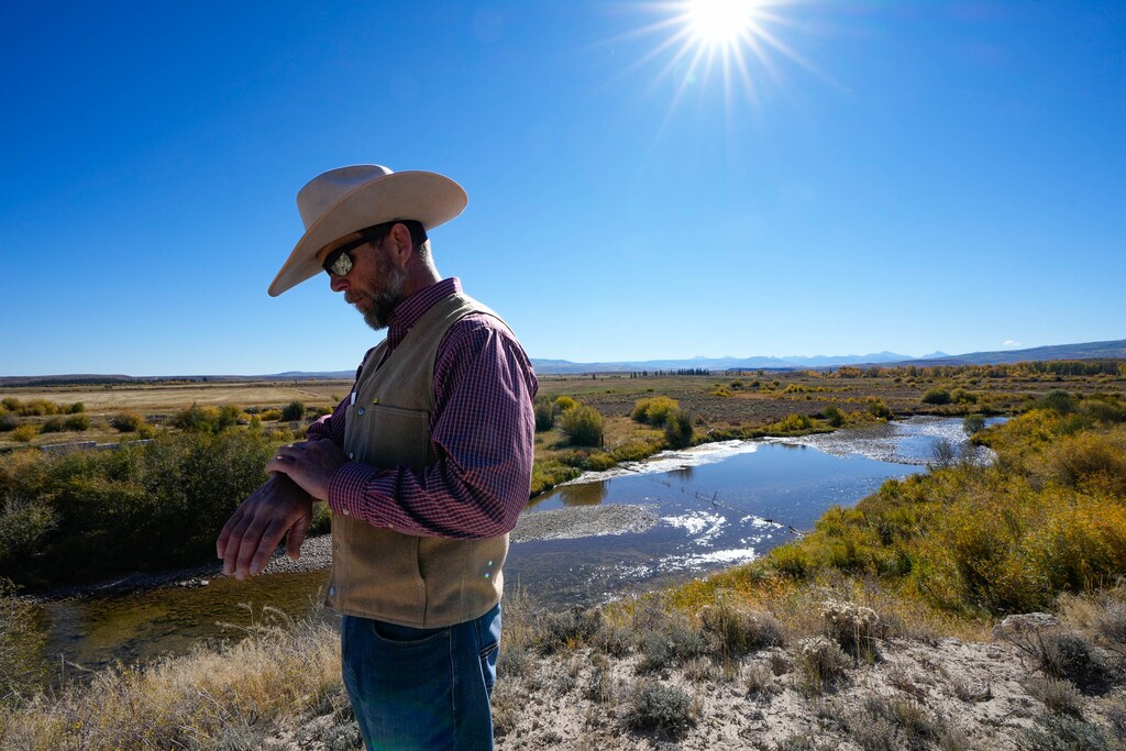 (Francisco Kjolseth | The Salt Lake Tribune) Adrian Hunolt, a rancher who raises cattle near the Bear River in Wyoming, discusses the importance of flood irrigation to both his livelihood and wildlife habitat on Oct. 5, 2022.