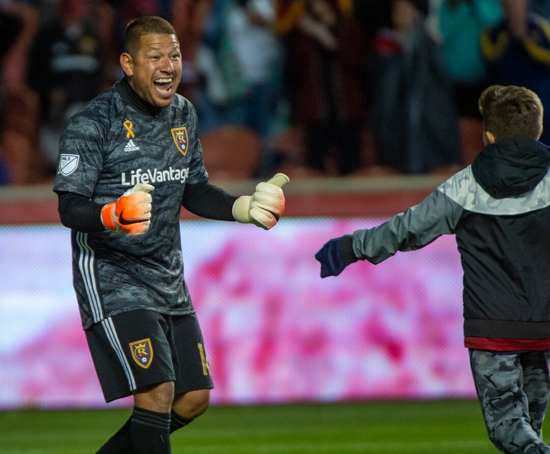 (Rick Egan  |  The Salt Lake Tribune)      Jett Rimando rushes out to congratulate his dad, as Real Salt Lake goalkeeper Nick Rimando (18) as Real Salt Lake defeats the Houston Dynamo 2-1 in his last regular season home game, in MLS soccer action, at Rio Tinto Stadium, Sunday, Sept. 29, 2019.