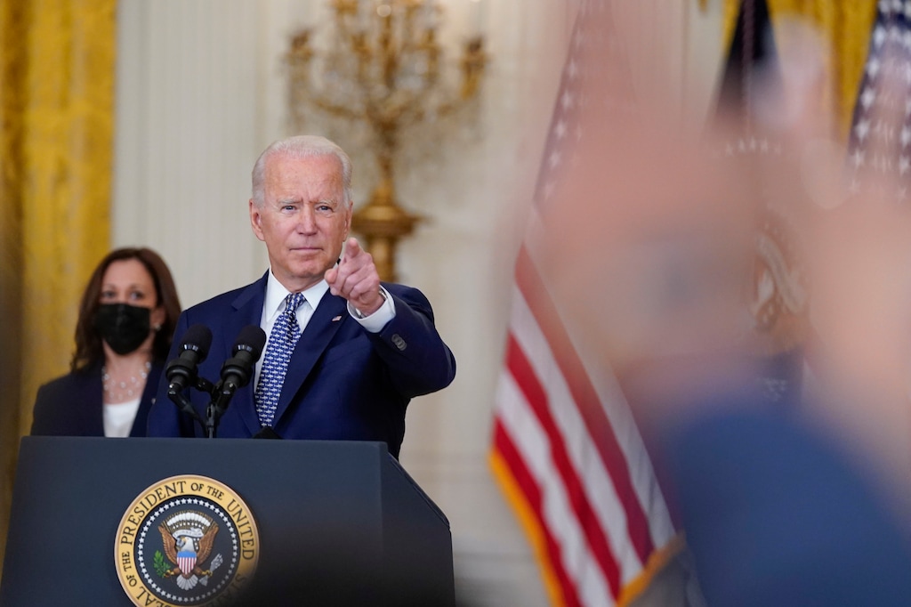 (Evan Vucci | AP) President Joe Biden gestures as he takes questions from members of the media after speaking about the bipartisan infrastructure bill from the East Room of the White House, Tuesday, Aug. 10, 2021, in Washington. Vice President Kamala Harris listens at left.