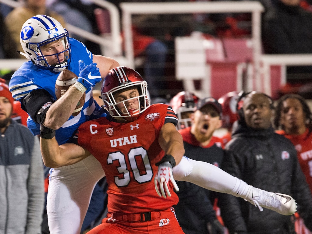 (Rick Egan  |  The Salt Lake Tribune)        Brigham Young Cougars tight end Matt Bushman (89) grabs a one handed pass, as Utah Utes linebacker Cody Barton (30) defends, in football action between the Brigham Young Cougars and the Utah Utes, at Rice-Eccles Stadium, Saturday, November 24, 2018.