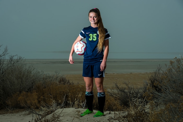 (Chris Detrick | The Salt Lake Tribune) Syracuse's Caroline Stringfellow poses for a portrait near Bridger Bay on Antelope Island State Park Tuesday, December 12, 2017.
