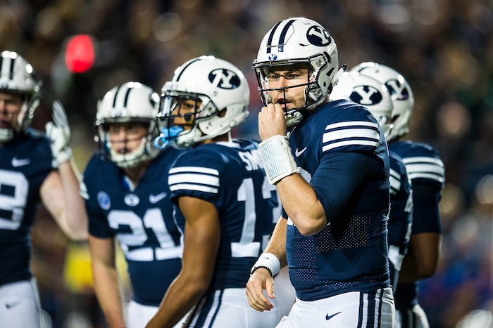 (Chris Detrick  |  The Salt Lake Tribune)  Brigham Young Cougars quarterback Tanner Mangum (12) during the game LaVell Edwards Stadium Friday, October 6, 2017. 