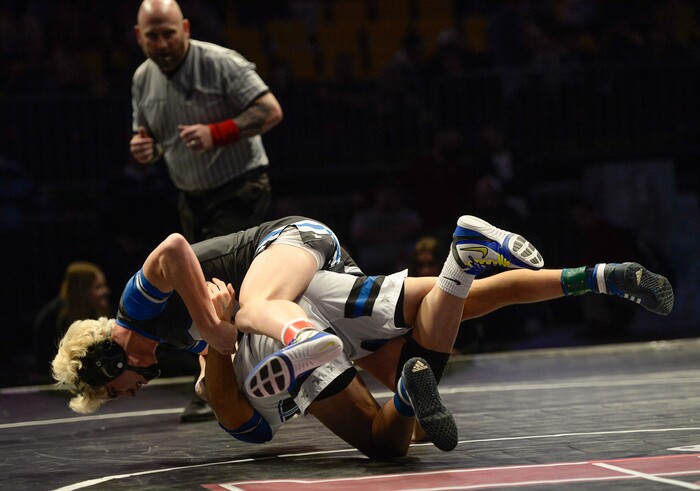(Francisco Kjolseth  |  The Salt Lake Tribune)  Teammates Luis Garcia and Cole Zorn of Pleasant Grove battle each other in the Class 6A 132 weight class state wrestling championship match at the Utah Valley University UCCU Center on Thursday, Feb. 8, 2018.