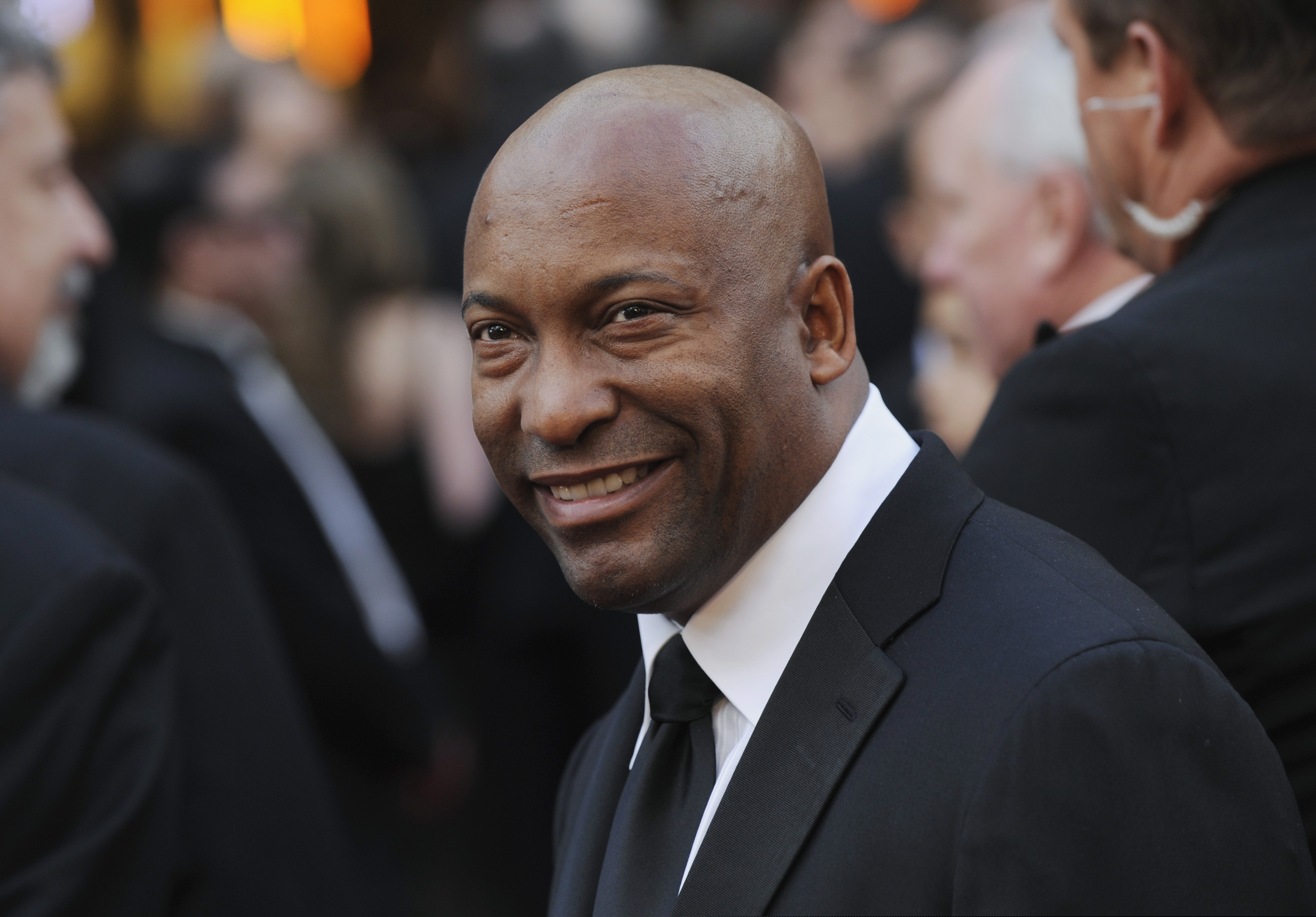 (Chris Pizzello | Associated Press file photo)  Director John Singleton arrives at the 80th Academy Awards in Los Angeles in 2008. Oscar-nominated filmmaker John Singleton has died at 51, according to statement from his family Monday, April 29, 2019. He died Monday after suffering a stroke almost two weeks ago.