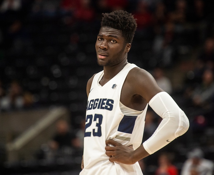 (Rick Egan  |  The Salt Lake Tribune)   Utah State Aggies center Neemias Queta (23) reacts after a call by the official, in basketball action in the Beehive Classic, between against the Utah State Aggies and Weber State Wildcats, a the Vivint Smart Home Arena, Saturday December 8, 2018.

 