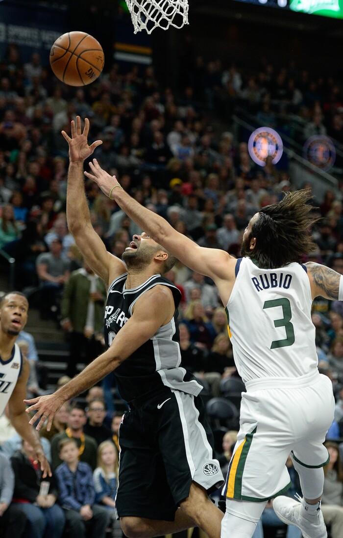 (Francisco Kjolseth  |  The Salt Lake Tribune)  Utah Jazz guard Ricky Rubio (3) tries to put the pressure on San Antonio Spurs guard Tony Parker (9) during the first quarter of an NBA basketball game in Salt Lake City, Thursday, Dec. 21, 2017.