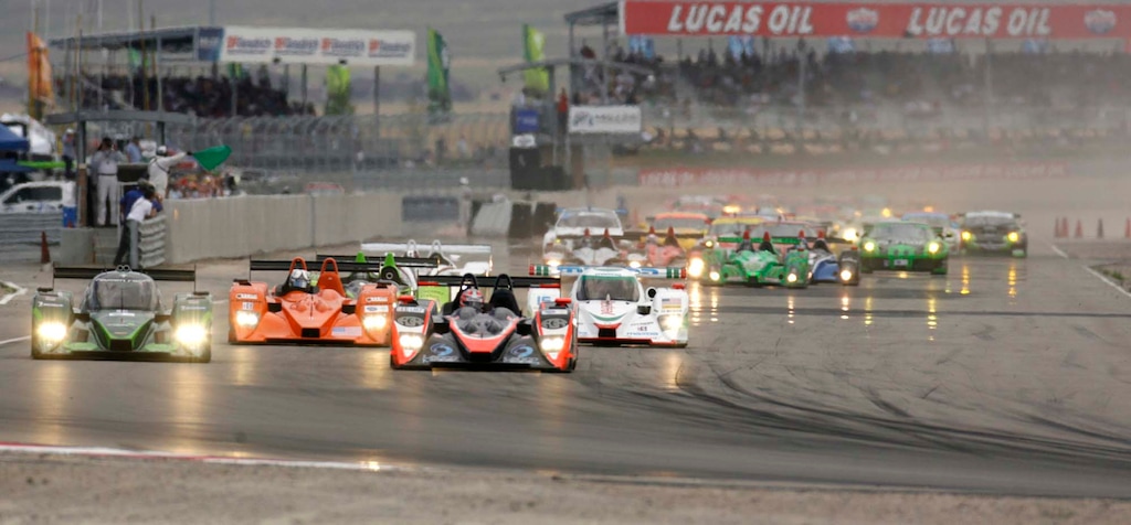 Photo by Trent Nelson  |  The Salt Lake TribuneCars enter turn one at the start of the Larry H. Miller Dealerships Utah Grand Prix, American Le Mans Series at Miller Motorsports Park in Tooele, Sunday, July 11, 2010.