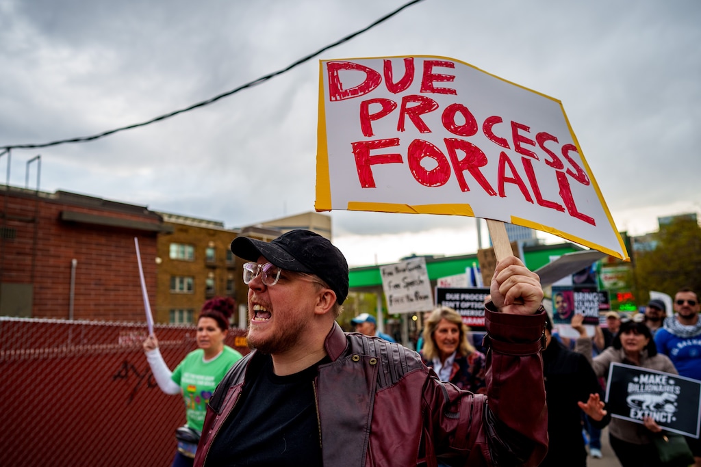 (Trent Nelson | The Salt Lake Tribune) People march to the consulate of El Salvador to protest the Trump administration's refusal to bring Kilmar Armando Abrego Garcia back, in Salt Lake City on Wednesday, April 16, 2025.