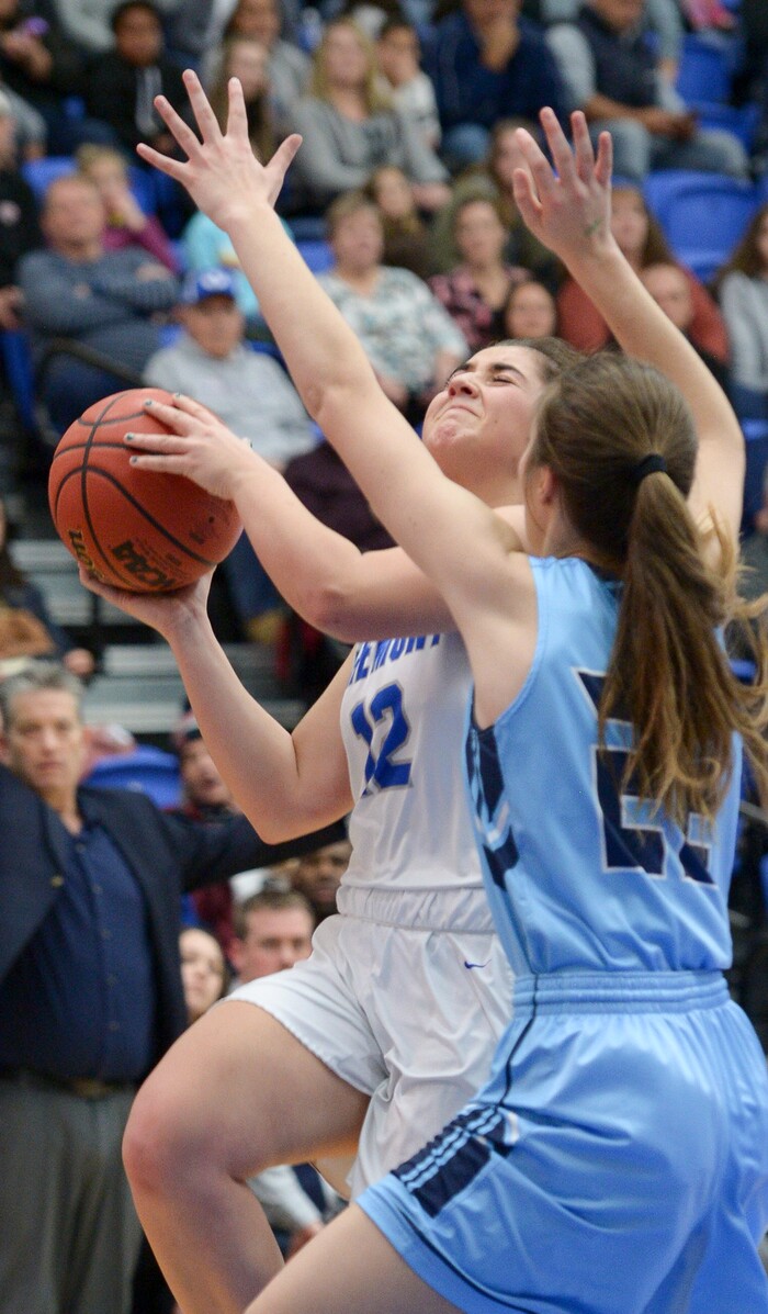 (Leah Hogsten  |  The Salt Lake Tribune) Fremont's Triniti Cash (22) shoots around Westlake's Tatum Peterson (23).  Fremont faces Westlake in their semifinal game of the 6A High School Girls' Basketball Tournament at SLCC in Taylorsville, Friday, Feb. 23, 2018. 