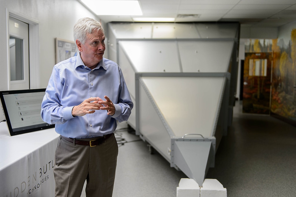 Trent Nelson | The Salt Lake Tribune
David Hall at his office in Provo, Tuesday June 14, 2016. Nearly 150 scientists and engineers are working for Hall intent on solving technical and social challenges for building a futuristic enclave modeled on Joseph Smith's Plat of the City of Zion. Research focuses on everything from low-impact toilets, new building materials and cooperative economic systems to methods for high-intensity food production. At right is an enclosure for limiting radio interference.