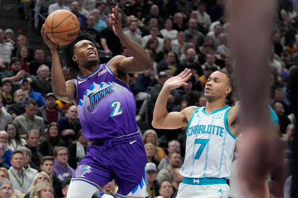 (Rick Bowmer | AP) Utah Jazz guard Collin Sexton (2) goes to the basket as Charlotte Hornets guard Bryce McGowens (7) defends during the first half of an NBA basketball game Monday, Jan. 23, 2023, in Salt Lake City.