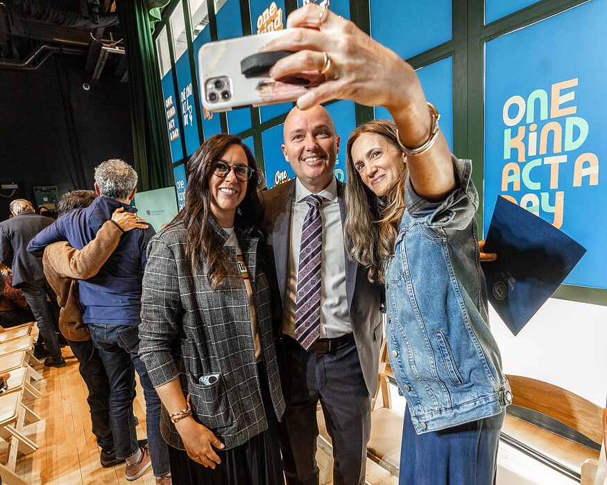(Leah Hogsten | The Salt Lake Tribune) Sisters Elizabeth Radcliffe, left, and Tiffany Hatch snap a selfie with Gov. Spencer Cox during the "One Kind Act a Day" campaign launch Tuesday, April 12, 2022.