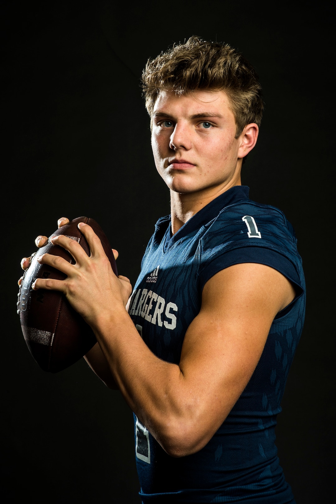 (Chris Detrick  |  The Salt Lake Tribune)  Corner Canyon quarterback Zach Wilson poses for a portrait Wednesday, December 13, 2017.  