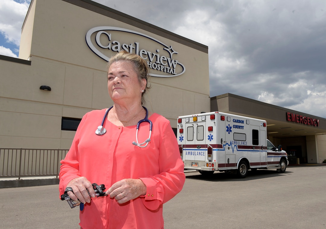 (Al Hartmann  |  The Salt Lake Tribune)  EMT Sue Copinga treated an injured mine rescuer in the back of an ambulance on the way to Castleview Hospital in Price after the second implosion in the Crandall Canyon mine.   Three rescuers died trying to reach six miners trapped 10 days earlier.