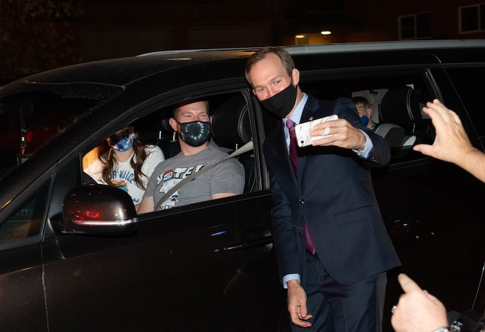 (Francisco Kjolseth  |  The Salt Lake Tribune) Democratic Rep. Ben McAdams, looking to retain his seat for Utah’s 4th Congressional District, takes a selfie with Rep. Andrew Stoddard, D-Sandy and his wife Rachel, as he hands out pre-ordered meals to friends and supporters, at Pat’s BBQ in Salt Lake City, as part of his small election night watch party on Tuesday, Nov. 3, 2020.