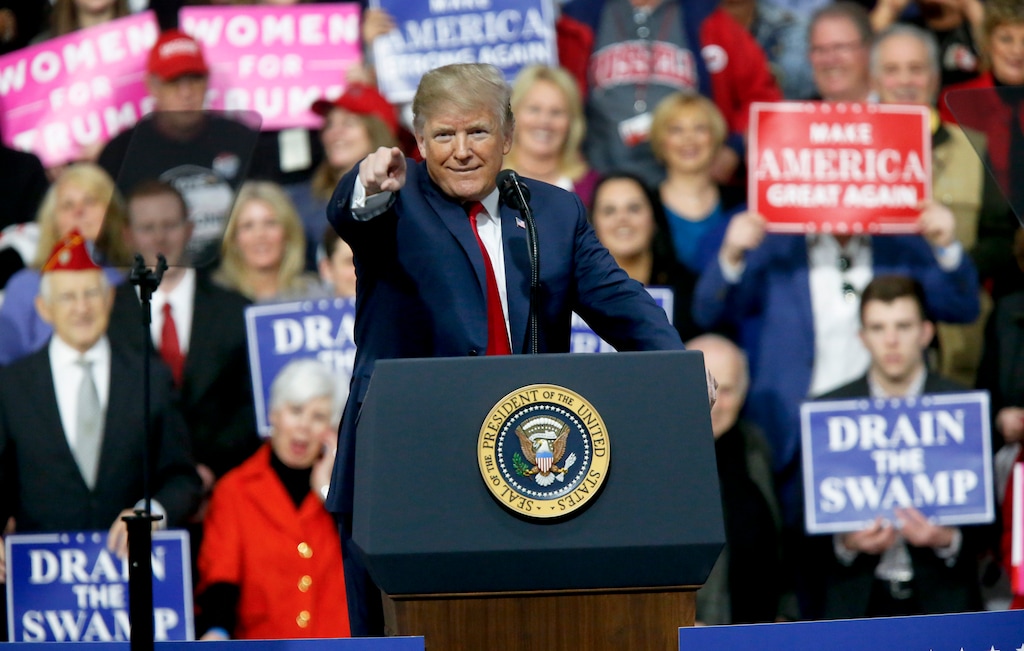 President Donald Trump reacts to the crowd while speaking at a campaign rally for Republican Rick Saccone in a hangar, Saturday, March 10, 2018, in Moon Township, Pa. Saccone is running against Democrat Conor Lamb in a special election being held March 13 for the Pennsylvania 18th Congressional District vacated by Republican Tim Murphy. (AP Photo/Keith Srakocic)