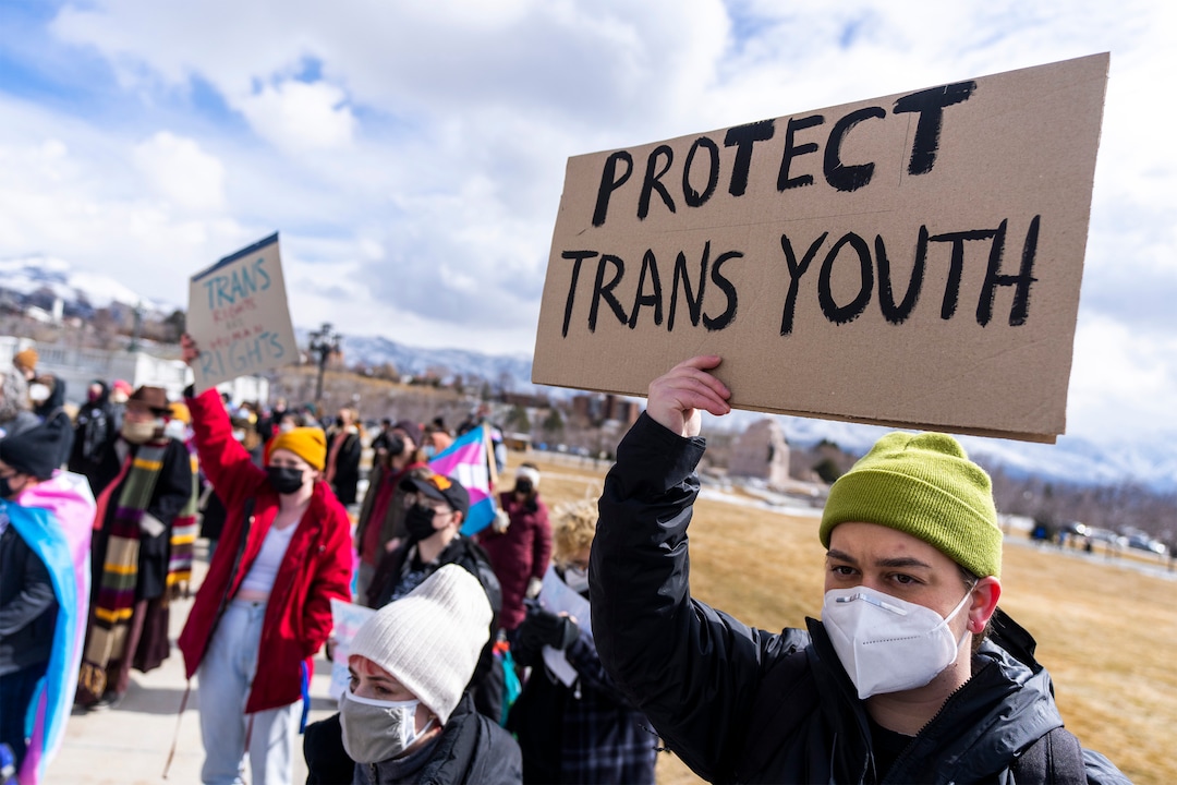 (Rick Egan | The Salt Lake Tribune)   Chelsea Parker joins more than 200 people on the steps of the Capitol for a rally, speaking out against Rep. Kera Birkeland's transgender sports bill, on Friday, Feb. 25, 2022.