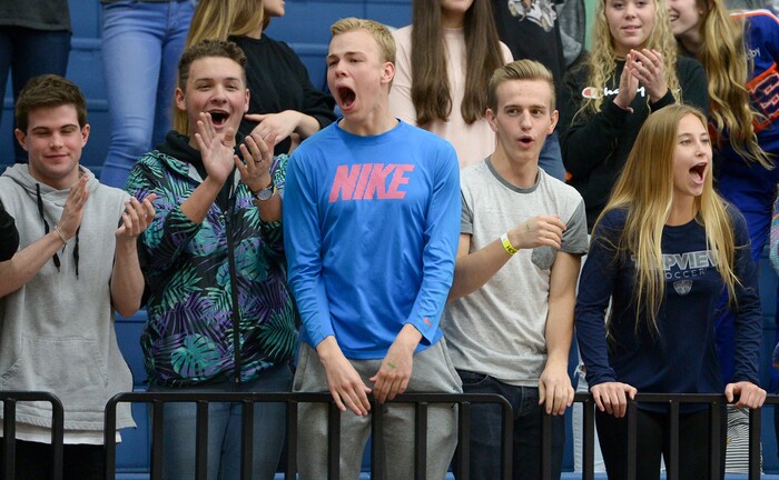 (Leah Hogsten  |  The Salt Lake Tribune) Timpview's boosters cheer Jasmine Espinoza (10) after swatting down the shot of Skyline's Amit Lustgarten (01).  Timpview faces Skyline in their semifinal game of the 5A High School Girls' Basketball Tournament at SLCC in Taylorsville, Friday, Feb. 23, 2018. 
