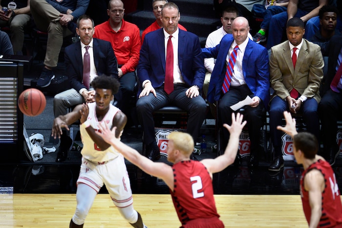(Scott Sommerdorf   |  The Salt Lake Tribune)   Utah's coaches watch during second half play as Utah defeated Eastern Washington 85-69, Friday, November 24, 2017. Left to right; assistant coach Tommy Connor, head coach Larry Krystkowiak, assistant coach Andy Hill, and assistant coach Demarlo Slocum at far right. The group has been together longer than most coaching teams in the NCAA.