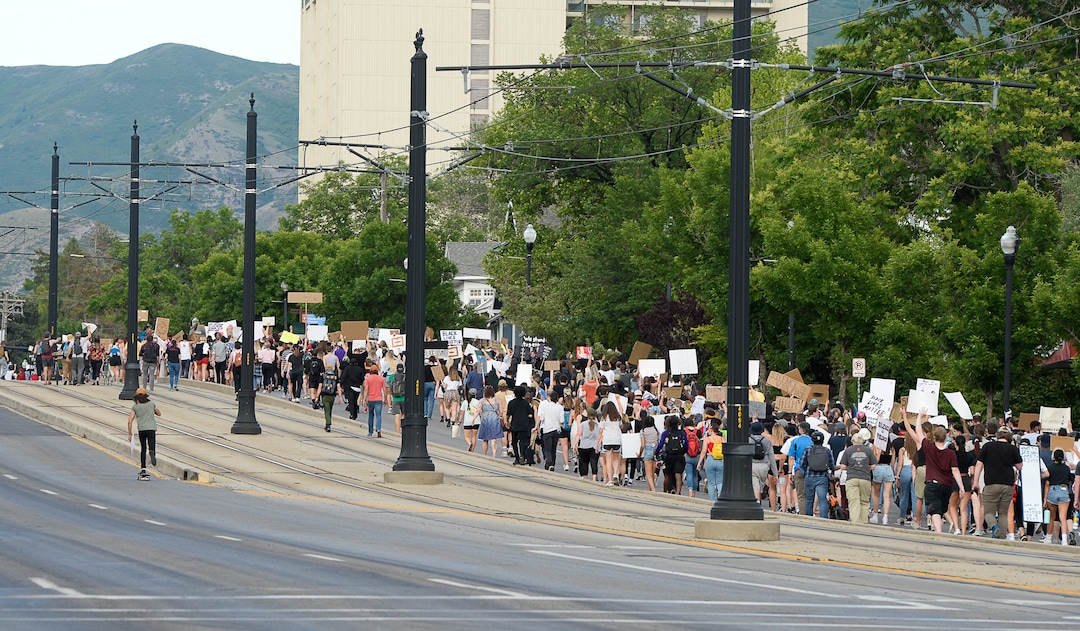 (Francisco Kjolseth  |  The Salt Lake Tribune) Demonstrators protesting against police brutality make their way to the University of Utah on Wednesday, June 3, 2020, in Salt Lake City, as the initially set 8 p.m. weeklong curfew was removed.