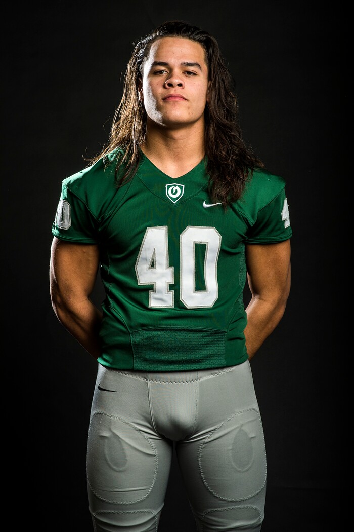 (Chris Detrick | The Salt Lake Tribune) Olympus tight end Cameron Latu poses for a portrait Wednesday, December 13, 2017.