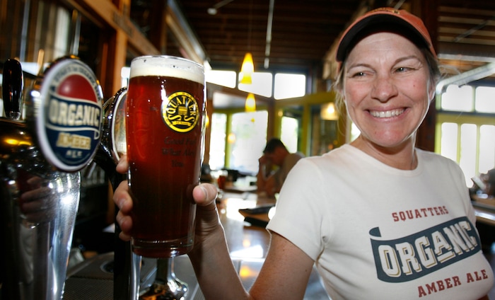 (Paul Fraughton | Tribune file photo) Jennifer Talley, brewmaster at Squatters, shows off their new organic amber ale, May 10, 2007.