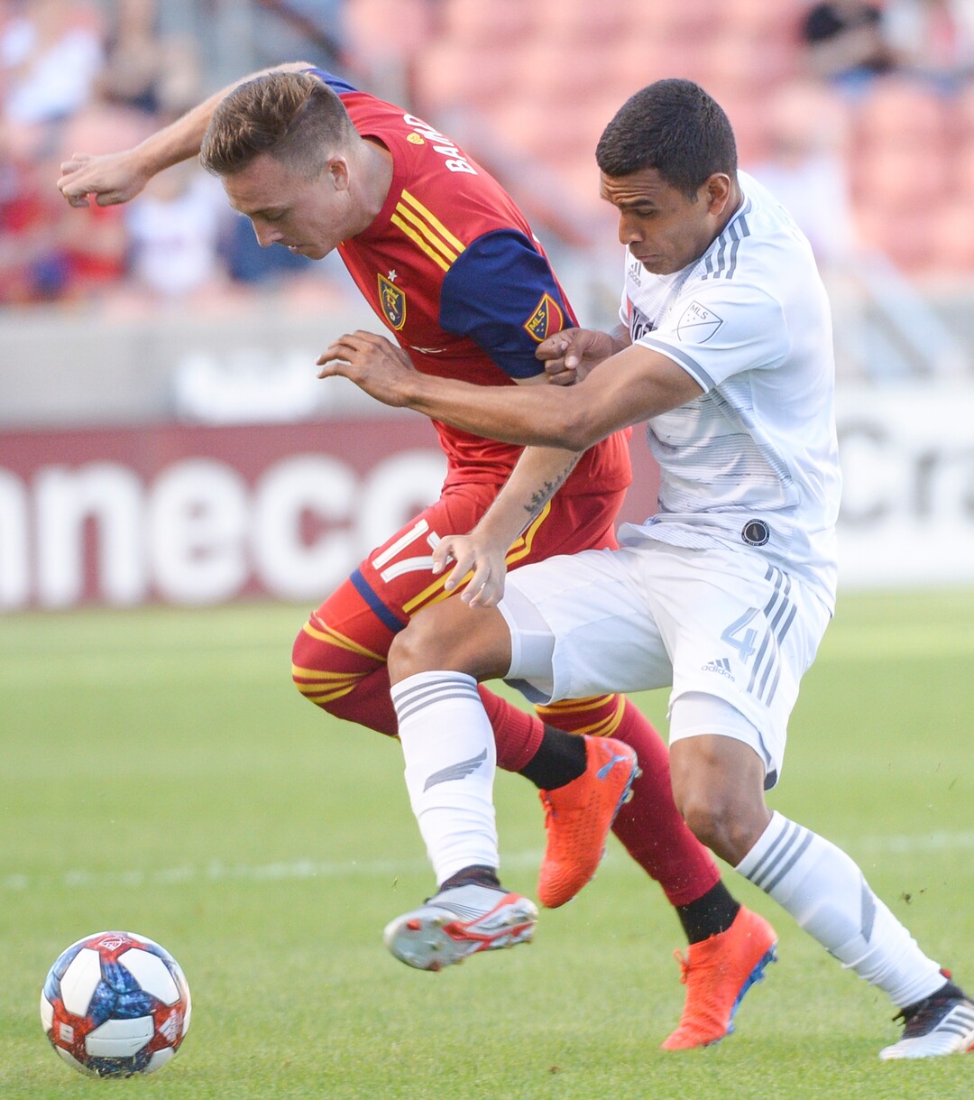 (Leah Hogsten  |  The Salt Lake Tribune) Real Salt Lake forward Corey Baird (17) and Los Angeles FC defender Eddie Segura (4) battle for possession as Real Salt Lake hosts Los Angeles Football Club in the fourth round of the Lamar Hunt U.S. Open Cup, June 11, 2019 at Rio Tinto Stadium in Sandy.