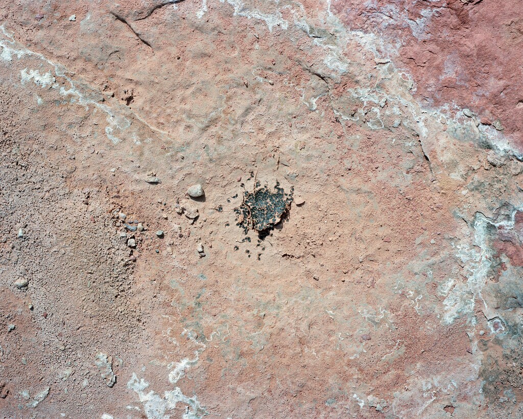 (Michael Lundgren | The New York Times) A dry ephemeral pool southwest of Moab, Utah.