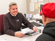 (Rick Egan | The Salt Lake Tribune) Dwayne Johnson, a missionary with the The Church of Jesus Christ of Latter-day Saints, helps a client at Welfare Square in 2023. The Utah-based faith has expanded the opportunities for single adult men 40 and older to serve full-time missions.
