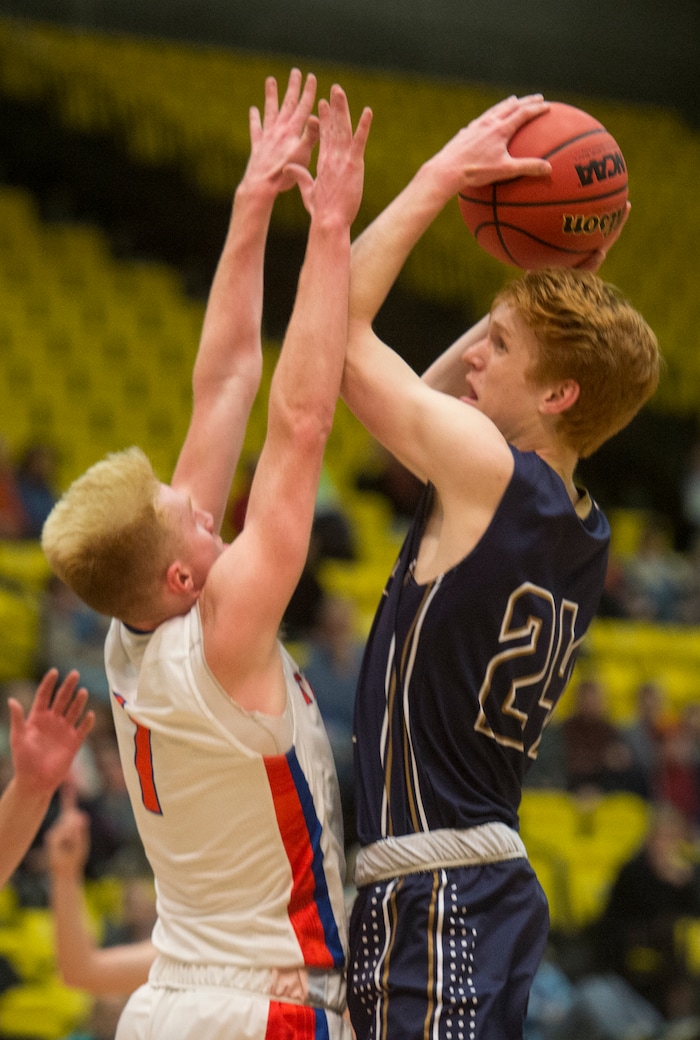 (Rick Egan | The Salt Lake Tribune) Timpview Thunderbirds Hunter Erickson (1) is called for a personal foul as he guards Skyline Eagles Andrew Clark (24), in 5A basketball playoff action between the Timpview Thunderbirds and at the Skyline Eagles, at the UCCU Center in Orem, Monday, Feb. 26, 2018.