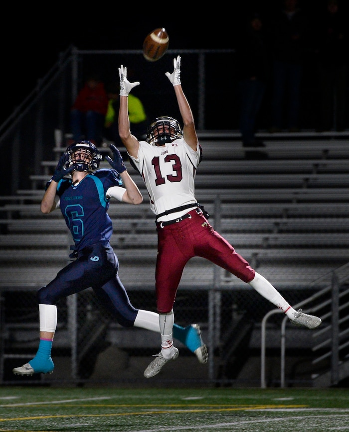 (Scott Sommerdorf   |  The Salt Lake Tribune)   Juab WR Tanner Wright makes this catch in front of Juan Diego DB Dawson Stiefel to set up a TD during first half play. Juan Diego beat Juab 33-28, Friday, October 6, 2017. 