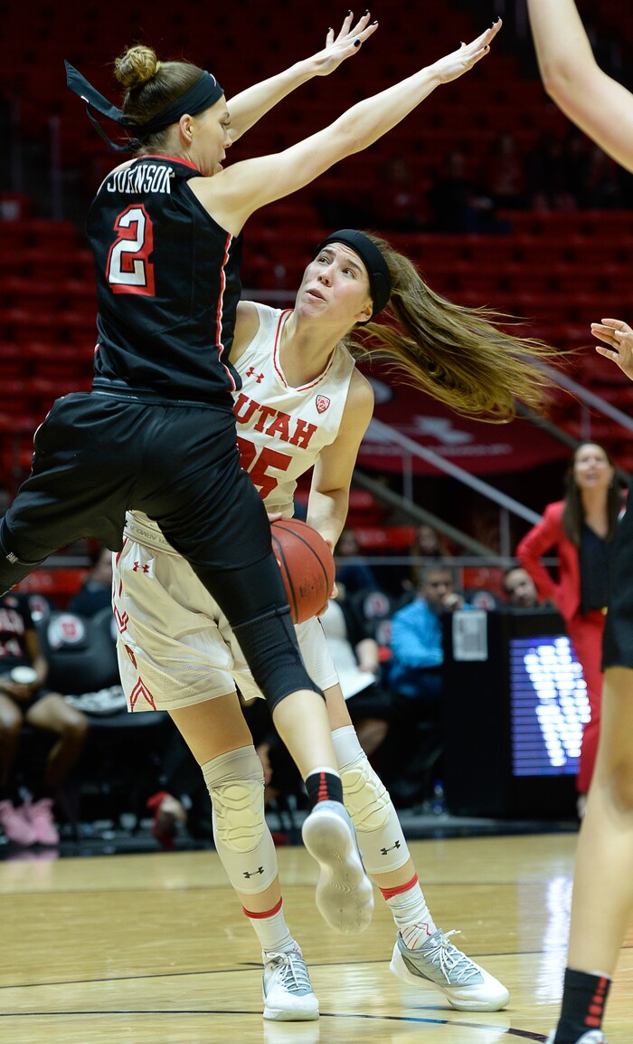 (Francisco Kjolseth  |  The Salt Lake Tribune)  Utah Utes forward Maurane Corbin (25) looks for a way around UNLV Rebels guard Brooke Johnson (2) as Utah hosts UNLV in women's NCAA basketball at the Huntsman Center, Thursday, March 15, 2018.