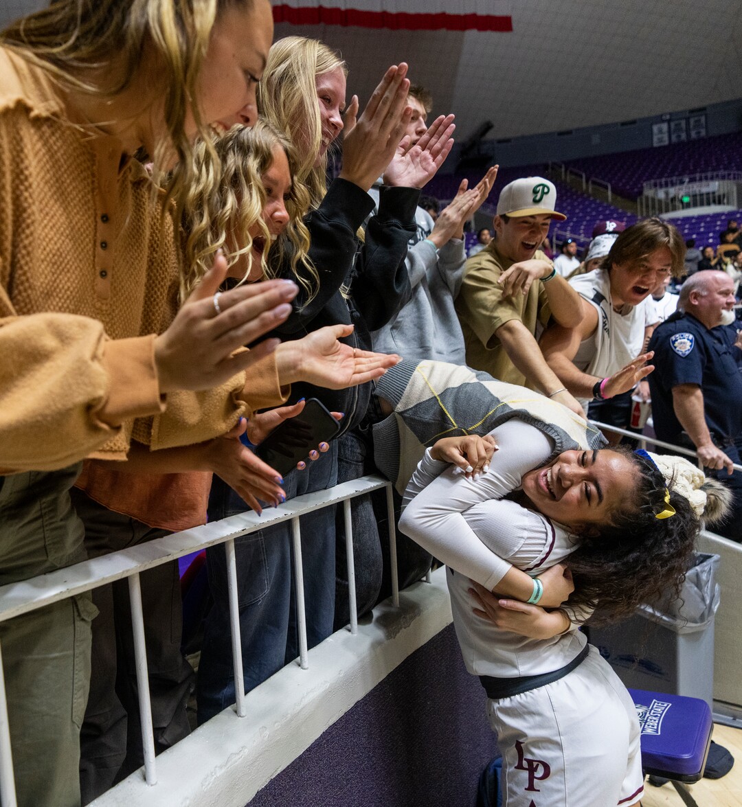 (Rick Egan | The Salt Lake Tribune) Makeili Ika (4) celebrates Lone Peak's win over the Skyridge Falcons, in the 6A girls Championship Game between Skyridge and Lone Peak, at Weber State, on Saturday, March 4, 2023.