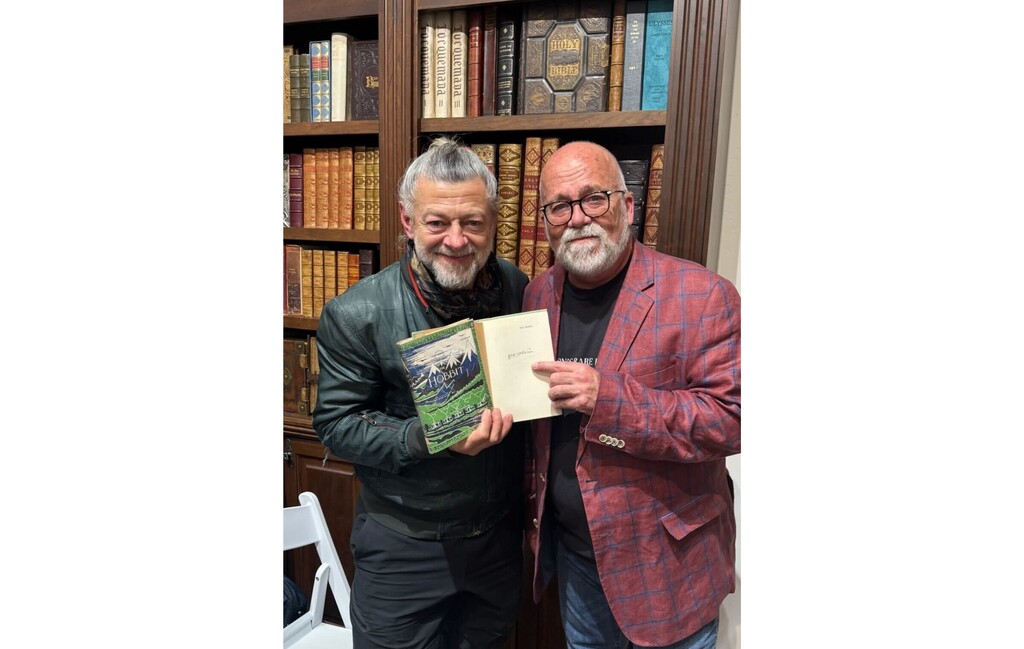 (Reid Moon) Reid Moon, owner of Moon's Rare Books, poses with Andy Serkis, an English actor and filmmaker who is known for playing the character of Gollum in "The Lord of The Rings" series.