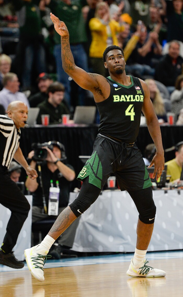 (Francisco Kjolseth  |  The Salt Lake Tribune)  Baylor Bears guard Mario Kegler (4) celebrates a three pointer as Syracuse faces Baylor in their first round menÕs NCAA March Madness tournament game at Vivint Smart Home Arena in Salt Lake City on Thursday, March 21, 2019.