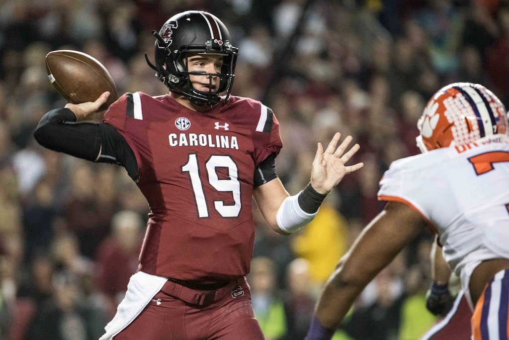 (Sean Rayford | AP file photo) In this Nov. 25, 2017, file photo, South Carolina quarterback Jake Bentley (19) attempts a pass against Clemson during the first half of an NCAA college football game, in Columbia, S.C. South Carolina’s Will Muschamp believes he’s got the strongest, deepest and most talented team in his four seasons as the Gamecocks’ coach.