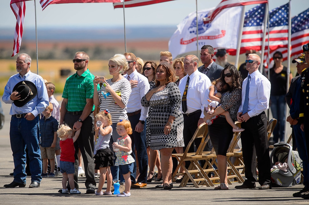 (Trent Nelson | The Salt Lake Tribune)  Family members look on as the body of fallen soldier Aaron Butler, who was killed last week in Afghanistan, arrives at the Monticello Airport, Thursday August 24, 2017.
