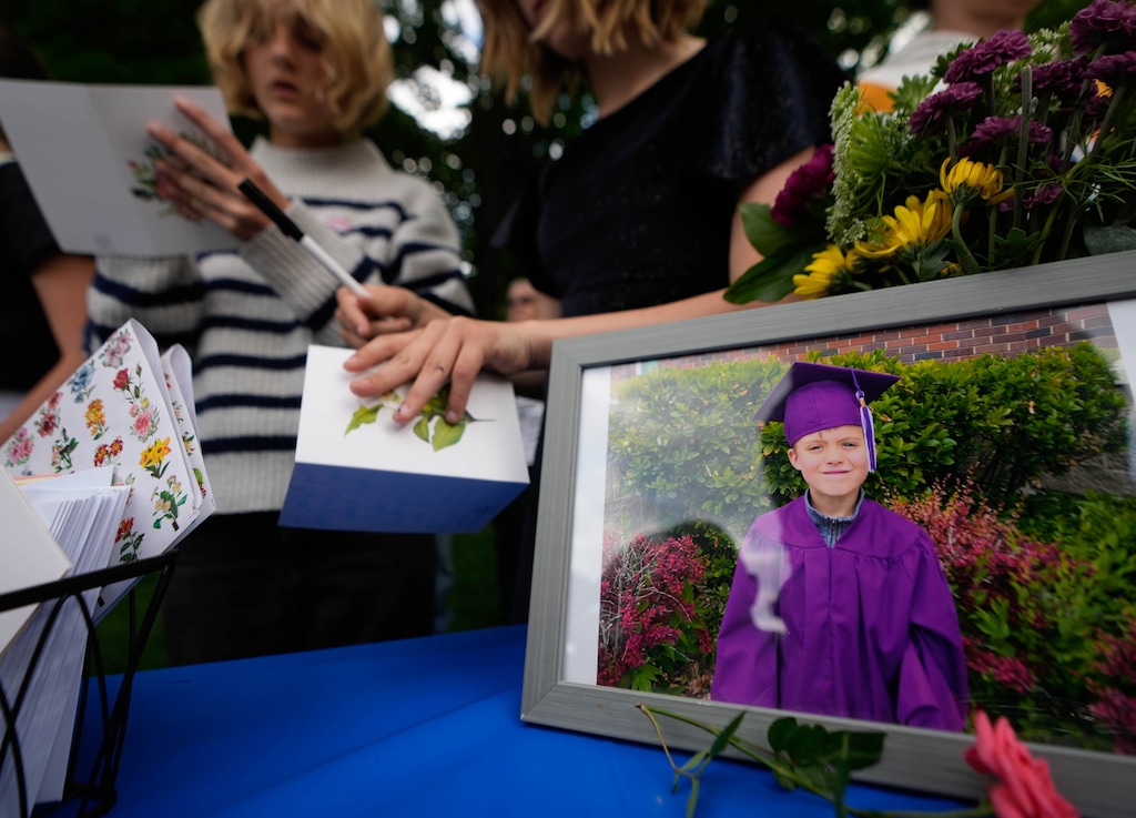 (Francisco Kjolseth | The Salt Lake Tribune) A photo of 6-year-old Uintah Elementary first grader Adlai Owen, displayed at Laird Park in Salt Lake City during a memorial on Wednesday, May 22, 2024. Police say Adlai’s father, Sam Owen, fatally shot Adlai before killing himself in an apparent murder-suicide on Saturday, May 18, 2024.