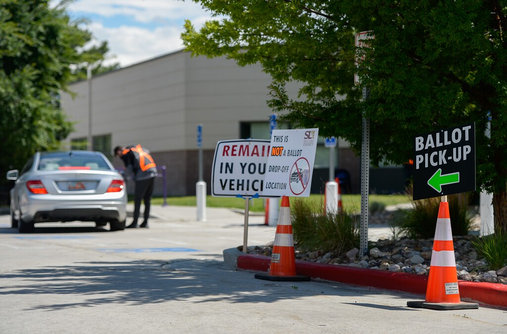 (Francisco Kjolseth | Tribune file photo) People line up for one of twelve drive-up voting assistance centers in Salt Lake County, Utah, at the Northwest Recreation Center during the Utah primary election on June 30, 2020.