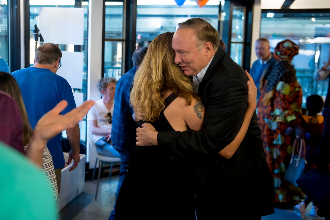 (Jeremy Harmon  |  The Salt Lake Tribune) Jim Dabakis  hugs a supporter during an election night party in Salt Lake City on Tuesday, August 13, 2019.