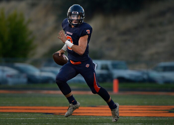 (Scott Sommerdorf   |  The Salt Lake Tribune)   
Brighton QB Alexander Zettler scrambles during first half play. Skyline held a 14-10 lead at the half over Brighton, Friday, September 15, 2017.