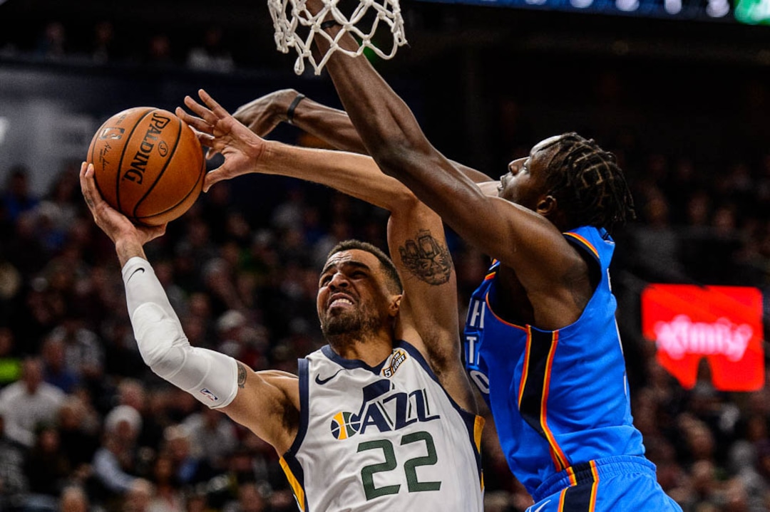 (Trent Nelson | The Salt Lake Tribune)  Utah Jazz forward Thabo Sefolosha (22) defended by Oklahoma City Thunder forward Jerami Grant (9) as the Utah Jazz host the Oklahoma City Thunder, NBA basketball in Salt Lake City, Saturday December 23, 2017.