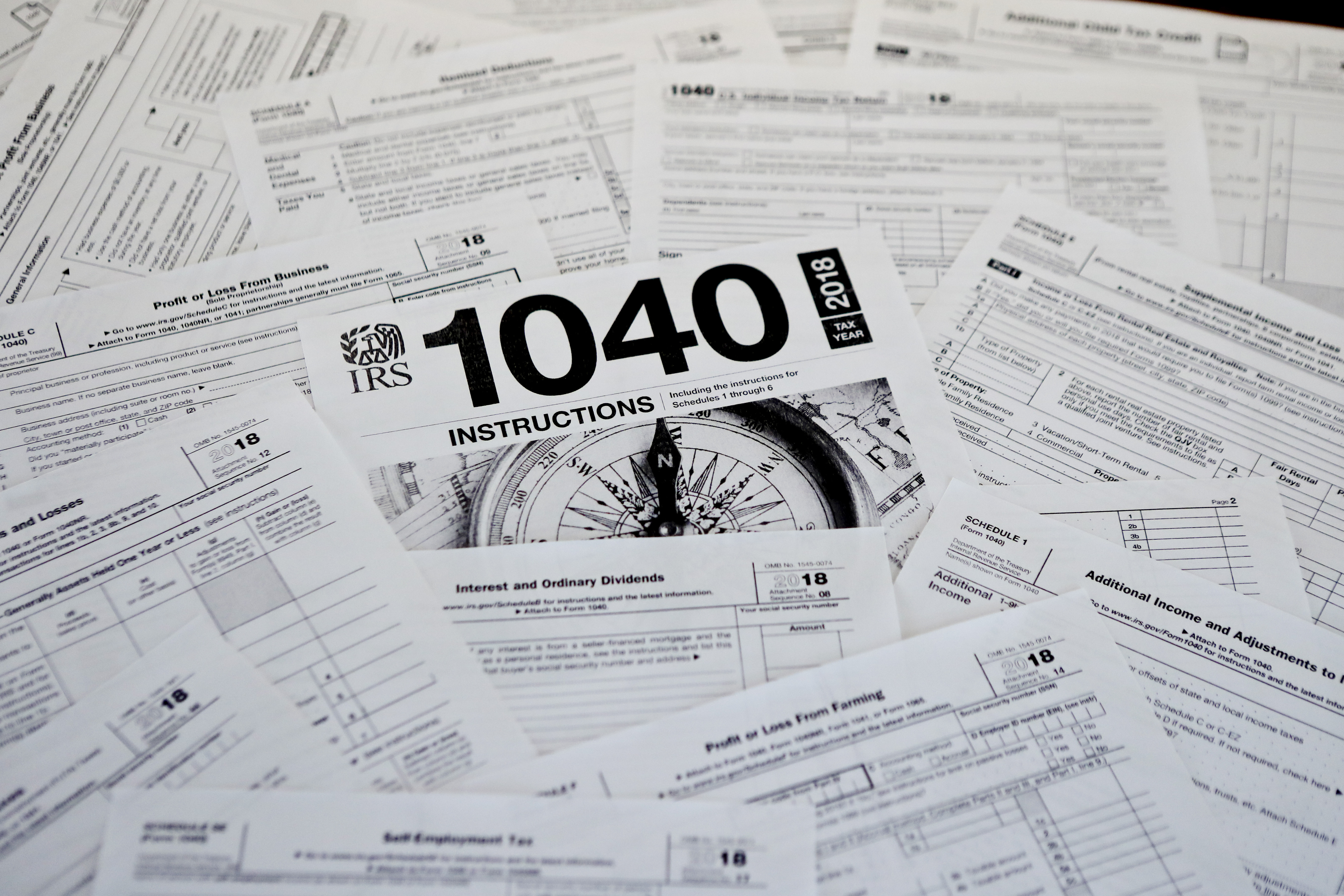 (Keith Srakocic | AP file photo) This Feb. 13, 2019, photo shows multiple forms printed from the Internal Revenue Service web page that are used for 2018 U.S. federal tax returns.